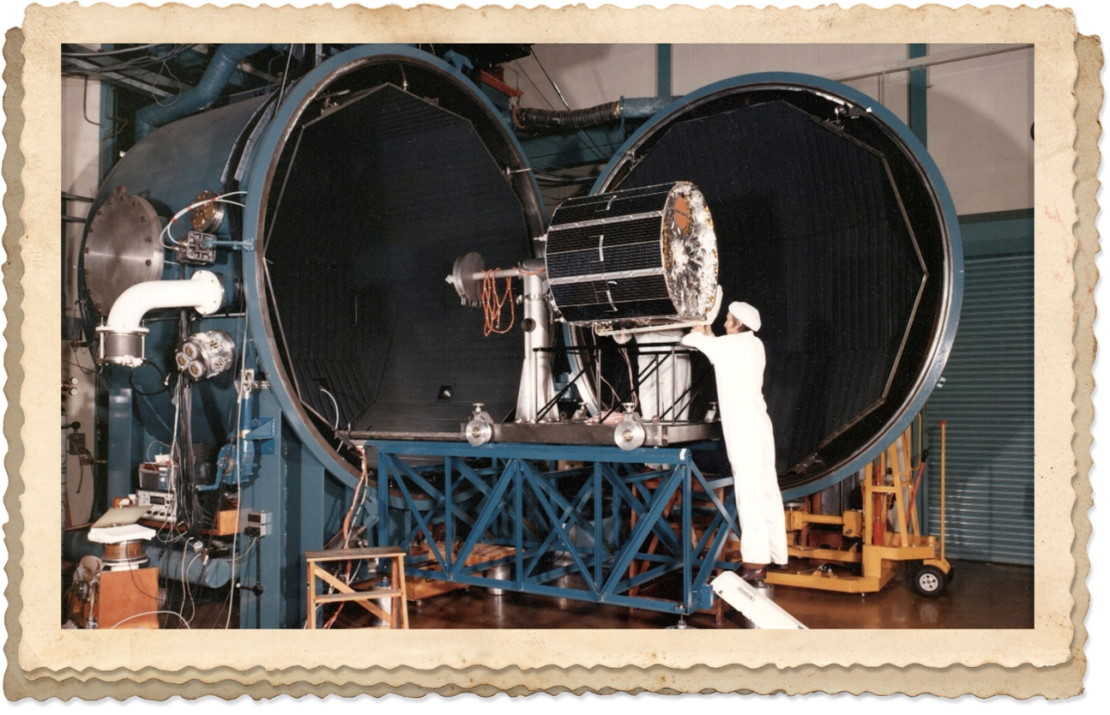 Photo of space equipment being pushing into a testing chamber