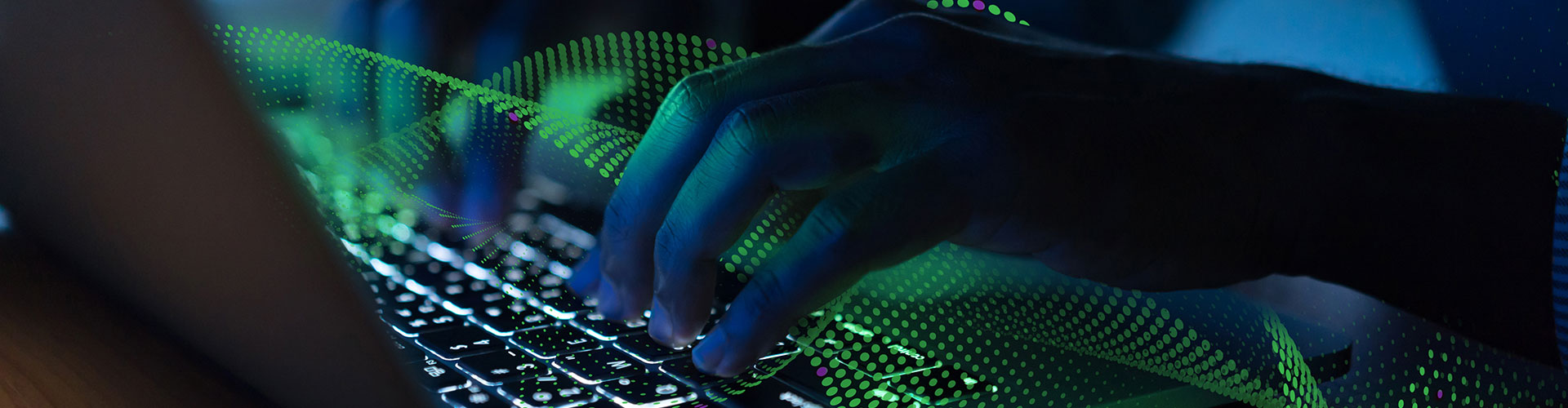 Hand typing on a keyboard with flowing pattern of green dots overlaid