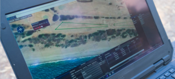 QUASAR software on a laptop screen