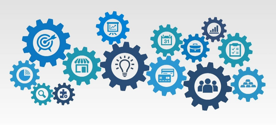 SME (Small Medium Enterprise) conceptual image showing meshing cogs with things like targets, light bulbs and people in them