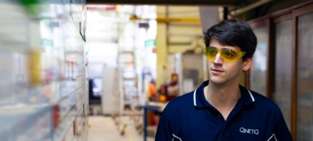 QinetiQ Australia graduate wearing yellow safety glasses