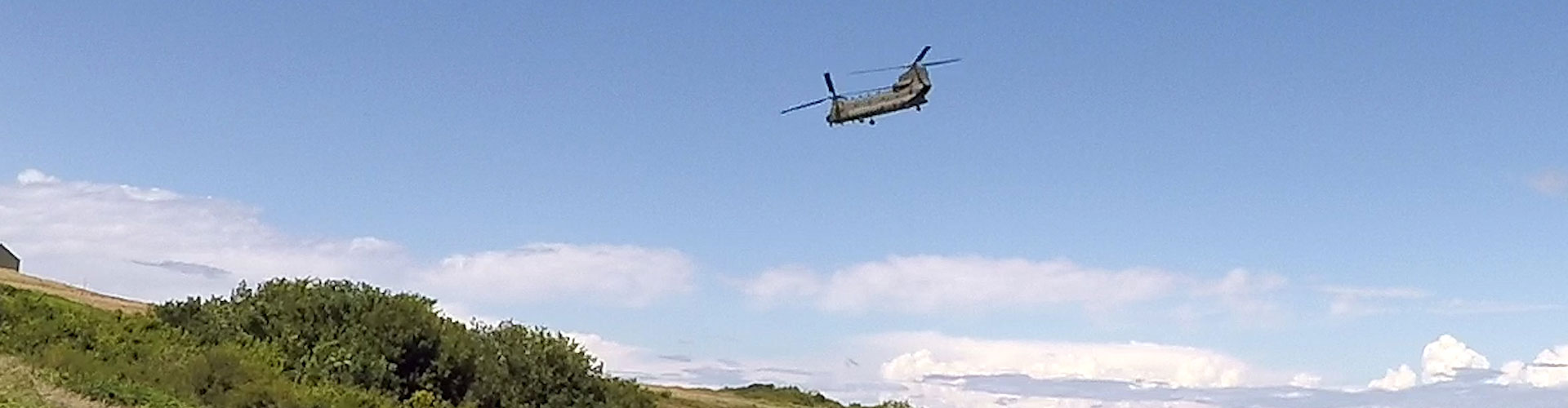 Chinook flying in blue skies over Aberporth range