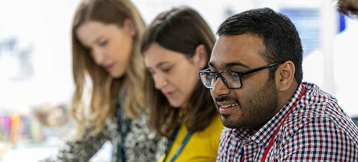 3 employees working together