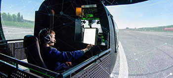 Simulator - image showing user of flight simulator