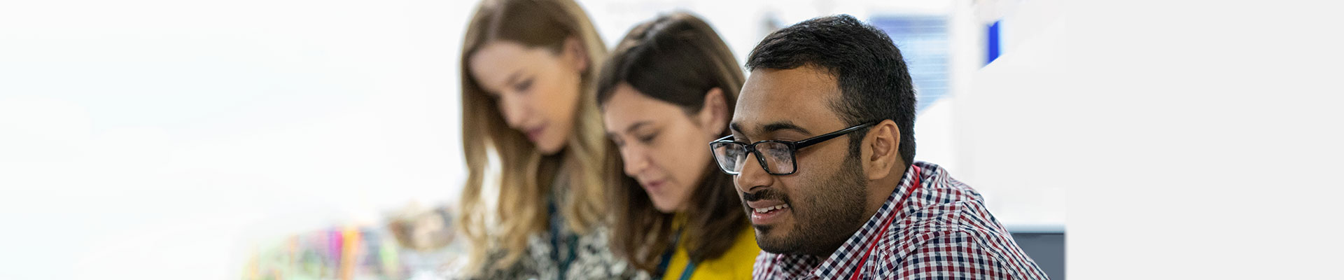 3 employees working together