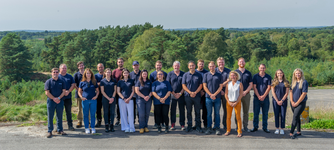 Group photo of the team at Hurn Proving Ground